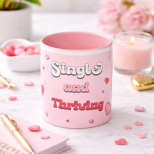 Single and thriving mug in pink ceramic with retro lettering